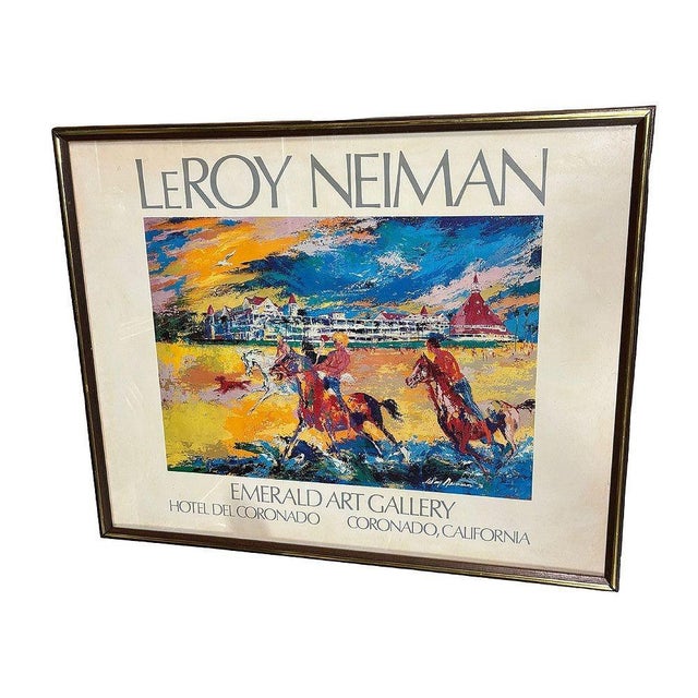 This framed poster print of LeRoy Neiman's *Hotel Del Coronado*, offered by Emerald Art Gallery, captures the vibrant...