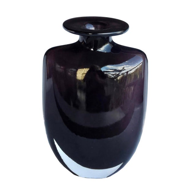 Offered is a vintage cased glass vase designed by Kjell Engman for Kosta Boda. While this color is sometimes referred to...