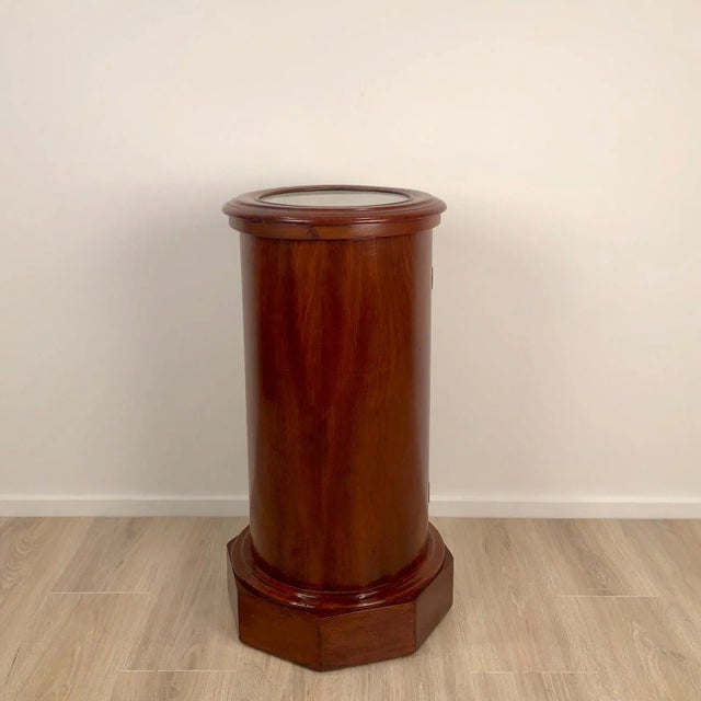 Victorian mahogany column cabinet. Made in England circa 1870.