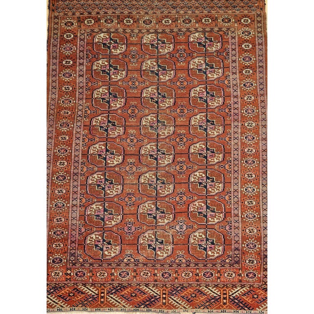 3’ 5” x 5’ Vintage Turkmen Tekke rug in an allover pattern from the early 1900s. The rug has a beautiful and graceful...