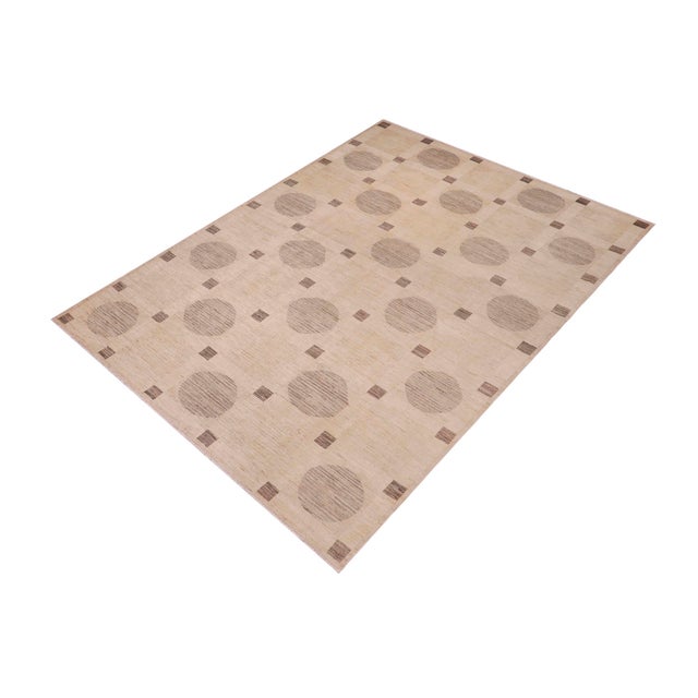Transform your home's interior with a stunning hand-knotted Gabbeh rug. These rugs are meticulously crafted with bold...