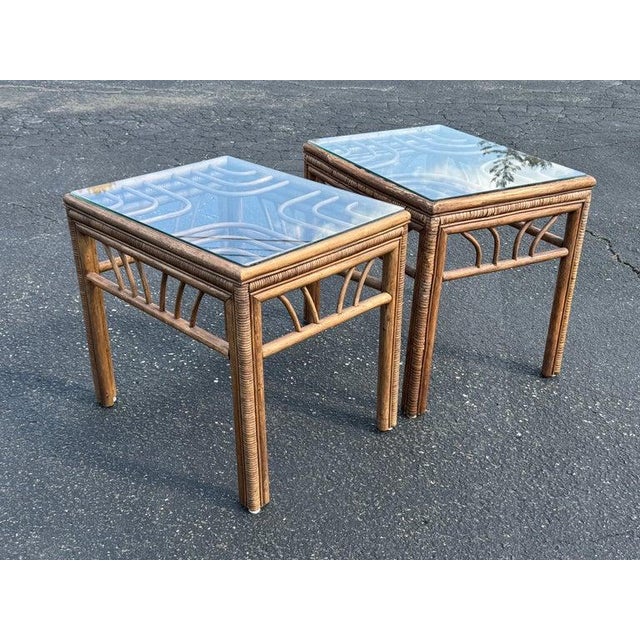 Pair of Rattan Bamboo End Tables with glass tops attributed to Brown Jordan. . Nice coastal decorator style. Boho chic...