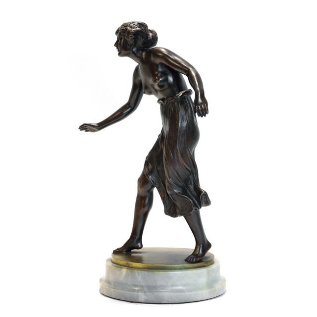 A fine antique bronze sculpture. By C. Rochlitz. Entitled "Tänzerin" (Dancer) and designed ca. 1920. In the form of a...