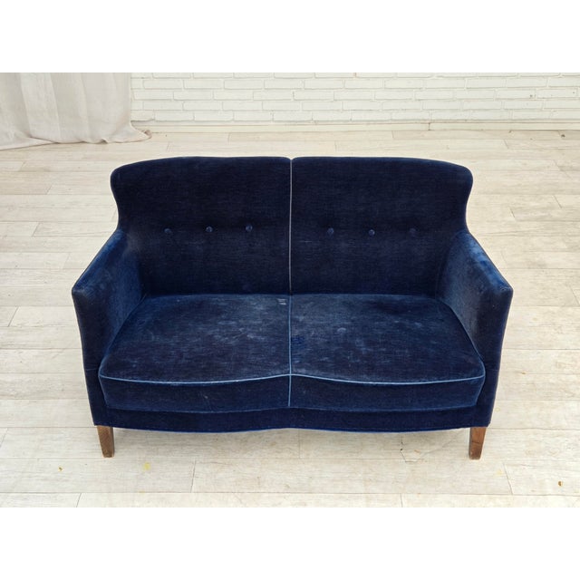 1960s, Danish 2-seater sofa. Dark blue furniture velour, ash wood legs, springs in the seat. Original condition: no...