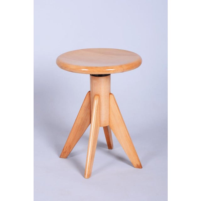 This piano stool, dating back to the 1940s from Czechoslovakia, is a design piece that beautifully captures the transition...