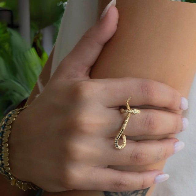 Mythology Snake Gold Vermeil & Black Diamond Design Ring, a striking piece that captures the mystique and power of ancient...