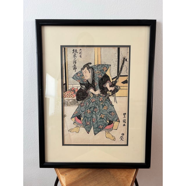 Antique Japanese Woodblock Print. Black frame measures: 21 inches by 16 inches.