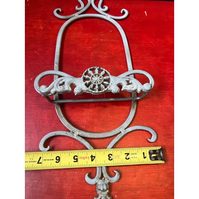 Up for consideration is a beautiful vintage oval shaped metal wall hanging plate holder. This would look lovely in your...