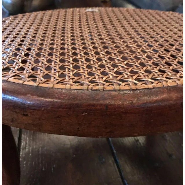 Footstool by Thonet, circa 1875. Rests off the first label. Caning intact Beautiful patina, no restorations. This piece is...