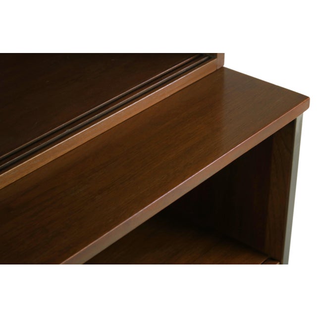 Designed by Paul McCobb and manufactured by Calvin Furniture, this four-drawer dresser features aluminum accents and...