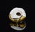 Authentic vintage Bvlgari Chandra pink tourmaline and white porcelain ring in 18K yellow gold. This beautifully crafted...