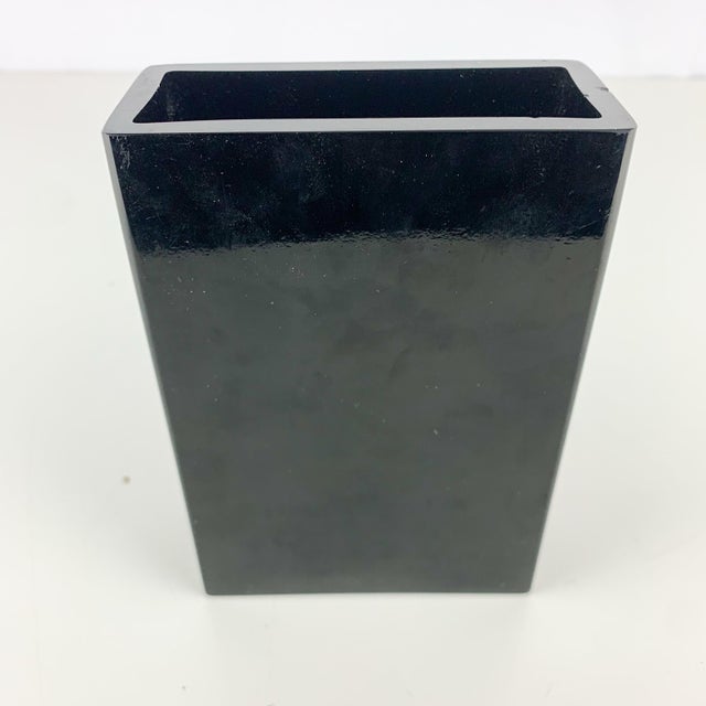 Stunning glass Kosta Boda glass rectangular vase in black with gold, pink, blue and rainbow glittery swirls. Signed on...