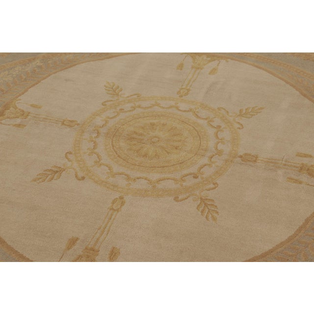 This 8x10 antique French Aubusson rug is a handwoven wool piece dating to circa 1890–1900. The rug features a graceful...