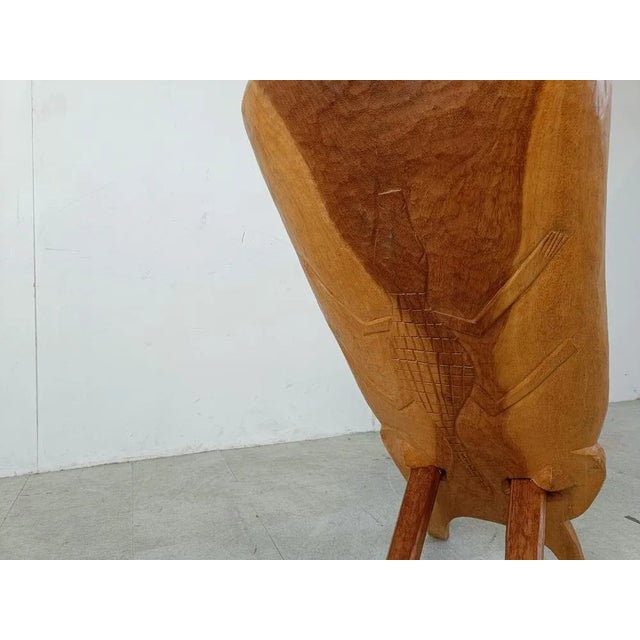 Traditional African birthing chairs consisting of two interlocking wooden planks carefully carved out. Beautiful natural...