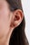 These elegant stud earrings feature 0.37 carats of emerald and diamond, set in 14k yellow gold. each measuring...