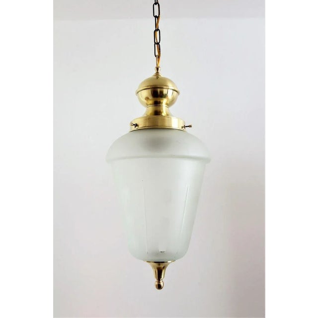 Gorgeous lantern or pendant lamp from the late Italian Mid-Century, made during the 1960s / 1970s. The pendant lamp is...