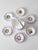 This vintage signed Crespo ceramic coaster set includes six hand-painted faience coasters housed within their original...