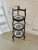Antique edwardian three tier cake stand with a turned finial to the top above a cross stretcher, three shaped mahogany...