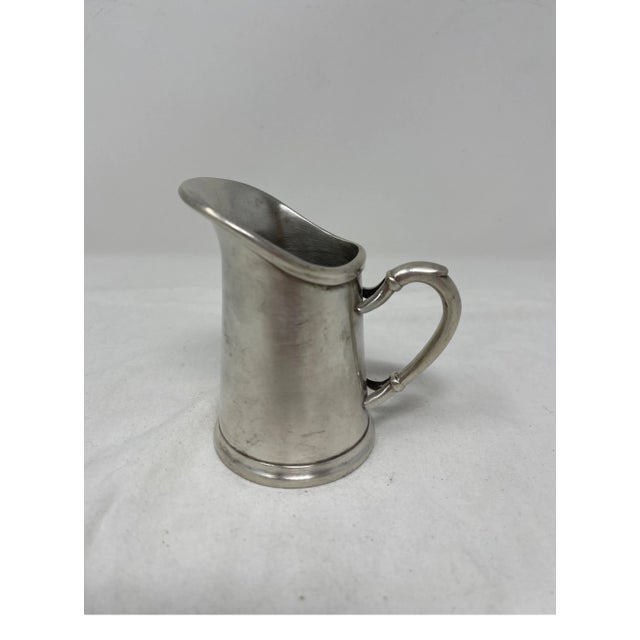 Enjoy your coffee or tea with this adorable little 19th century Hotel Silver creamer. Elevate your morning routine or use...
