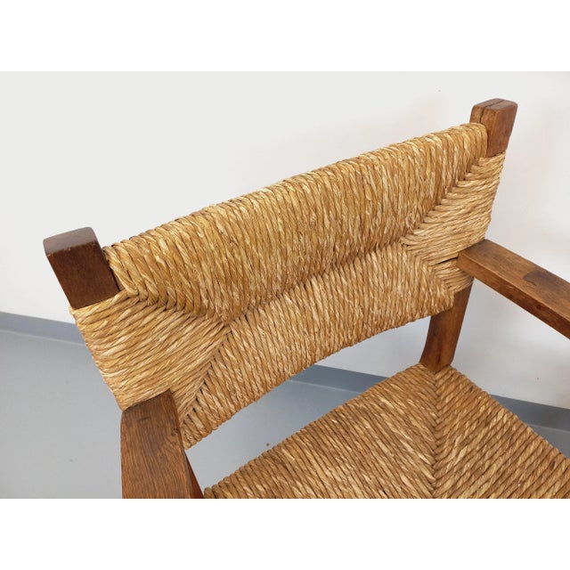 Two vintage Brutalist armchairs from the 1960s, in the style of Charles Dudouyt or Francis Jourdain, in a beautiful style,...