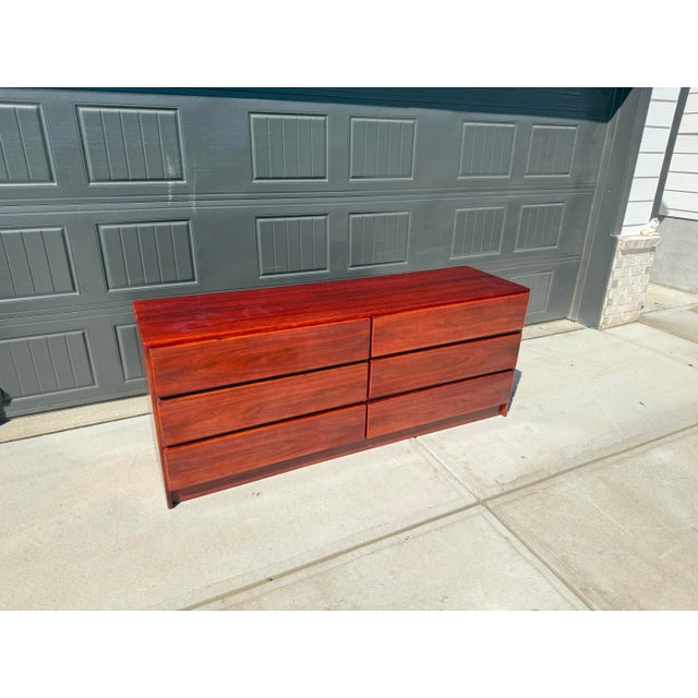 Vintage Mobican rosewood lowboy dresser featuring six spacious drawers and beautiful natural rosewood grain. A great...