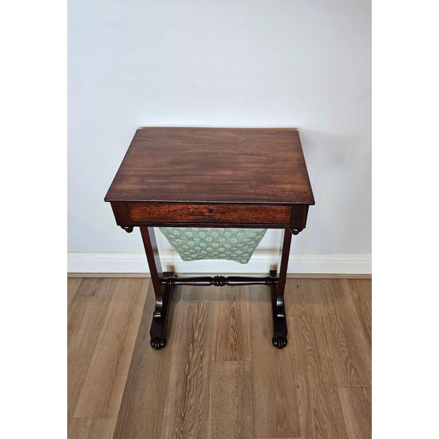 A nearly 200 year old English William IV Period rosewood and mahogany sewing stand work table with beautifully aged warm...