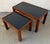 Elevate your living space with this exceptional set of two mid-century modern nesting tables. Masterfully crafted with...