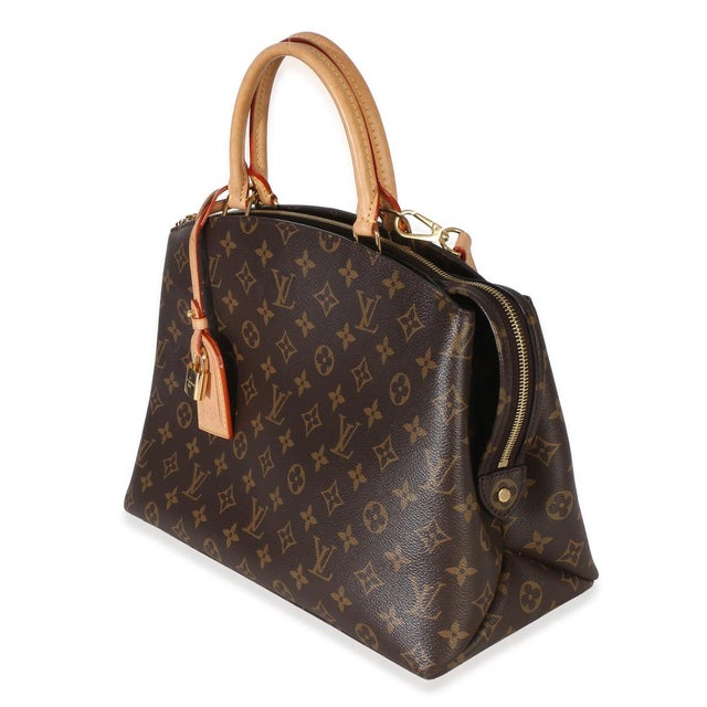Item #: Z154063 Interior Material: Fabric MSRP: 3,200 Features Interior: Three compartments. Three slip pockets. One zip...