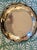 A beautiful small silver dish/plate that could be used as a wine coaster, tray for hors d'oeuvres, or bread plate....