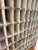 An authentic antique wooden printer’s type case cabinet, featuring approximately 120 individual compartments originally...