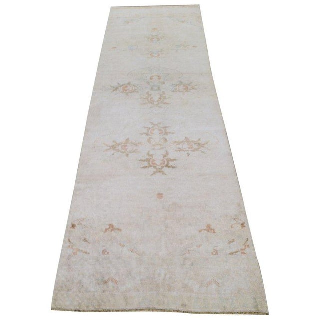 Hand-knotted with care using traditional rug-making techniques, this wool rug blends timeless craftsmanship with a modern...