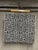 This newly crafted 22” X 22” accent/throw pillow features a bold black and cream tribal-inspired geometric motif fabric....