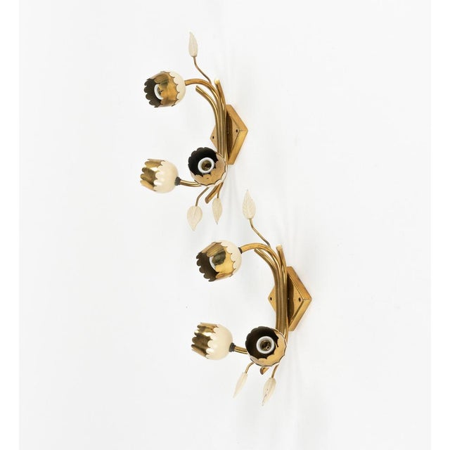 Midcentury beautiful pair of tulip flower sconces in brass. Made in Italy in the 1950s. Each lamp uses three bulbs. Up to...