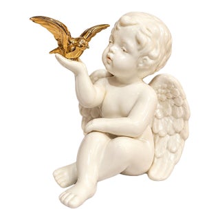 Vintage White Porcelain Cherub With Gold Bird Figurine, Hollywood Regency For Sale