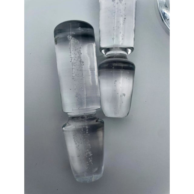 Rare Pair of Crystal Decanters with a Touch of Charm ✨ Admire the allure of these decanters, each adorned with a stunning...