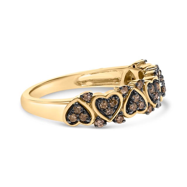 Crafted in the warm embrace of 10K yellow gold plating over .925 sterling silver, this exquisite ring strikes a note of...