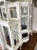 A truly magnificent and monumental 19th-century English antique display cabinet (curio cupboard), masterfully crafted with...