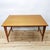 Dining table designed by Poul Cadovius in the 50s. Made of teak with teak veneer. This piece is attributed to the...