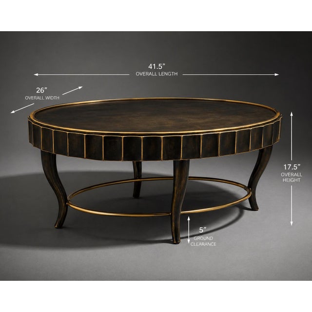 A striking vintage oval coffee table by Decca, thoughtfully refinished in a rich dark antique brass tone with hand-applied...