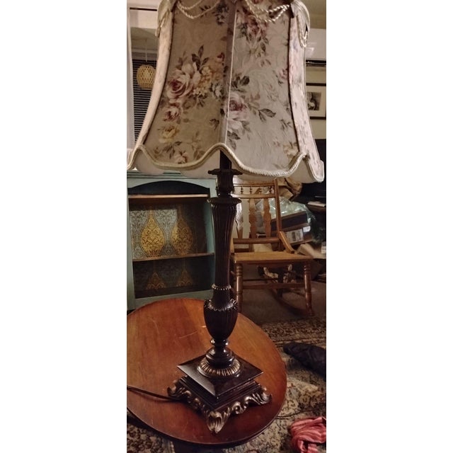 Cheyeene lamp in the Victorian/French/Louis XVI style. Bronze base with red marble. There are 4 curved feet with intricate...