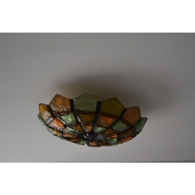Poliarte Brutalist ceiling light from the 1950s Wrought iron and thick glass cut by hand Very good condition 35 cm Working...