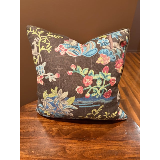 Custom pillows with down inserts Covered in a charming brown linen fabric with colorful whimsical palm trees and animals