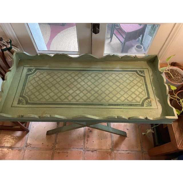 Beautiful hand painted tray table with X legs. Trellis detail painted in muddled pistachio green with dark green details....