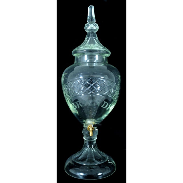 A rare Antique American crystal brandy/liquor bar dispenser, circa 1880. The crystal dispenser is of monumental size. The...