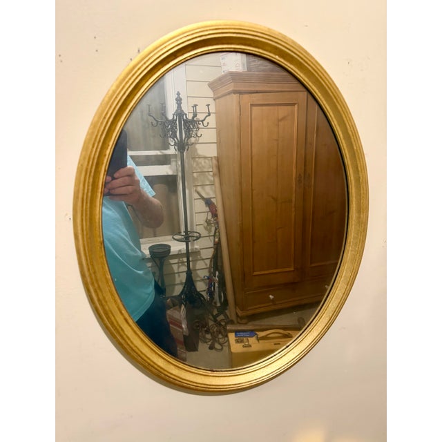 Vintage Gilt Italian Mirror With Nicely Distressed Mirror Glass. Measures 21.5" x " 17.5" wide. Wire on back for hanging....