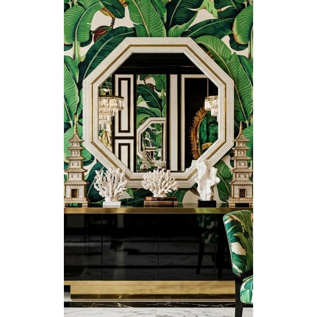 This monumental 48-inch vintage octagonal wall mirror brings classic Palm Beach Hollywood Regency design into a room....