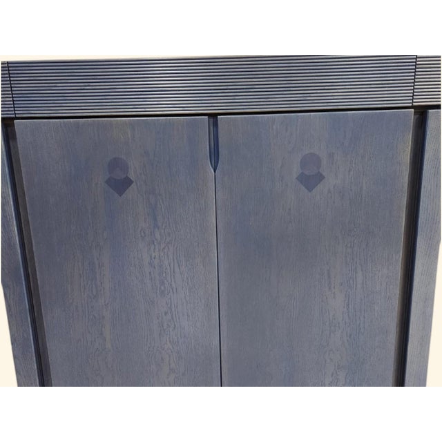 Elegant, functional and sophisticated design. The two side auxiliary columns and the upper drawers stand out, made with...