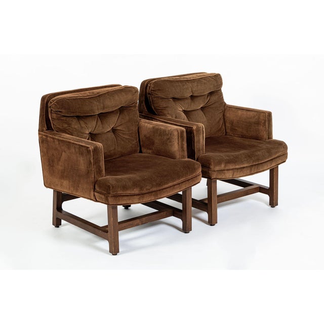 This pair of vintage American mid-century modern lounge chairs are attributed to Edward Wormley and date to the 1960s. The...