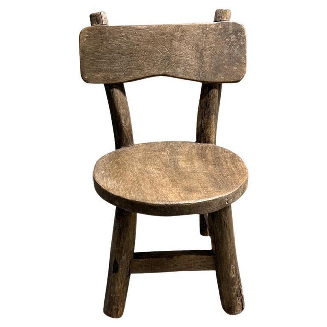 Antique village chair that can also be used as a side table. We have a small collection. Lovely patina and character on...