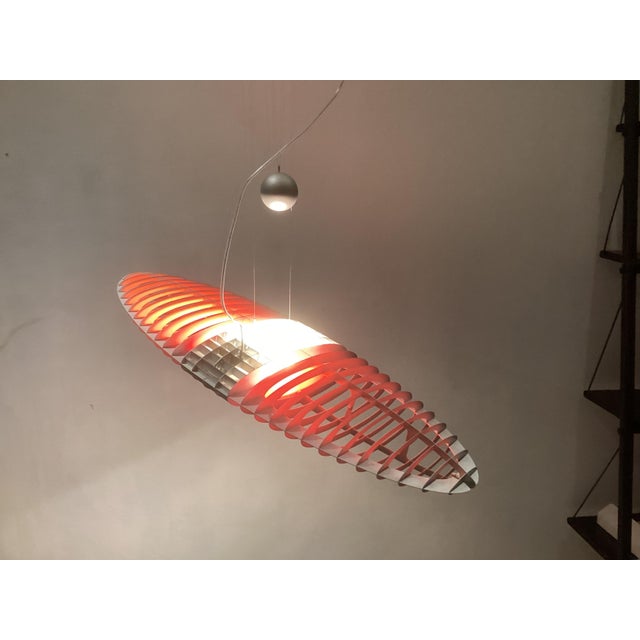 Titania Pendant Light in Aluminium from Luceplan, 1980s, in Very Good conditions. Designed 1980 to 1989 This piece has an...